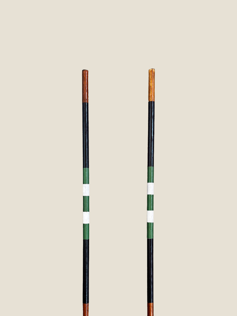 Vineyard 45-inch stained hardwood golf alignment sticks, shown side by side.