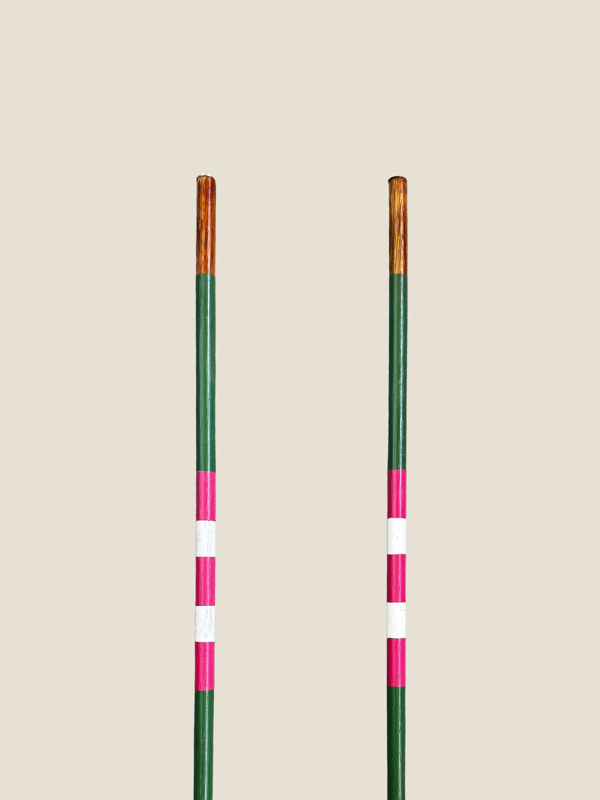 Azalea 45-inch stained hardwood golf alignment sticks, shown side by side.