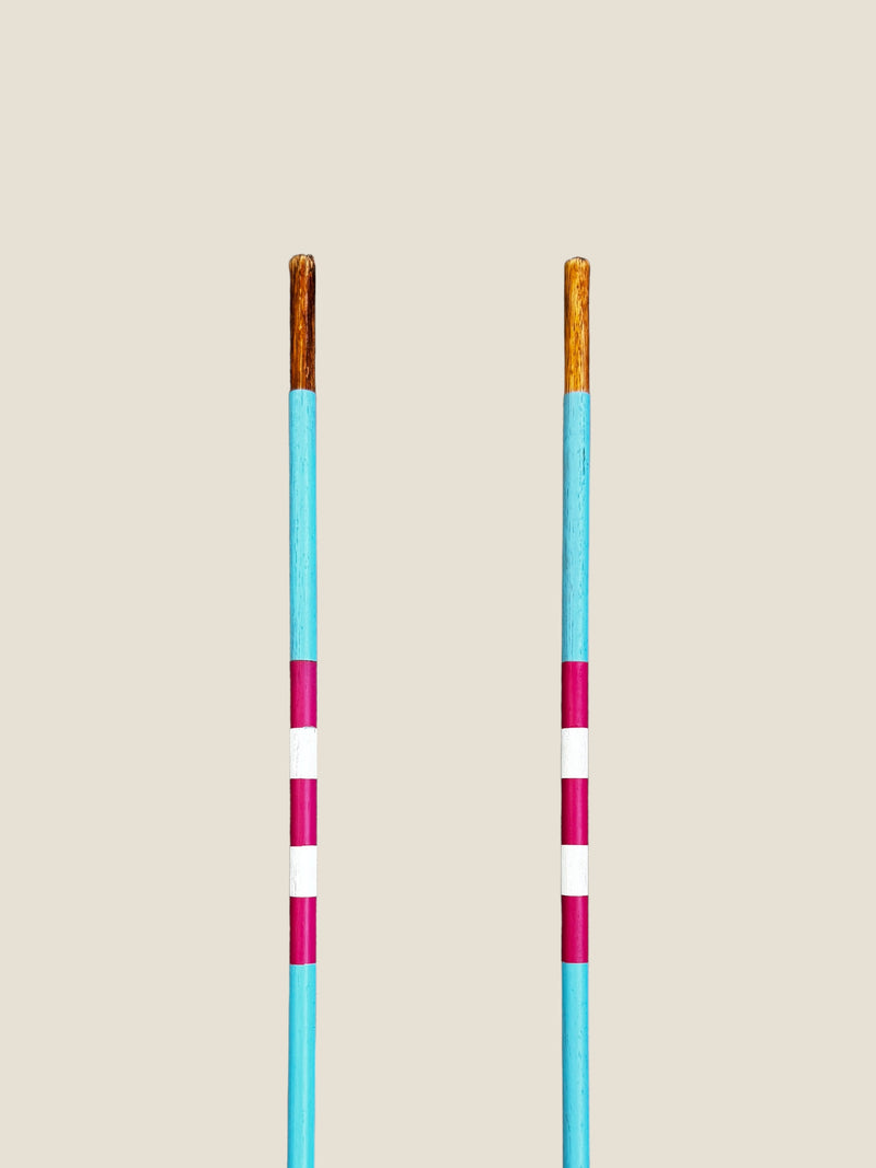 Pink Lake 45-inch stained hardwood golf alignment sticks, shown side by side.