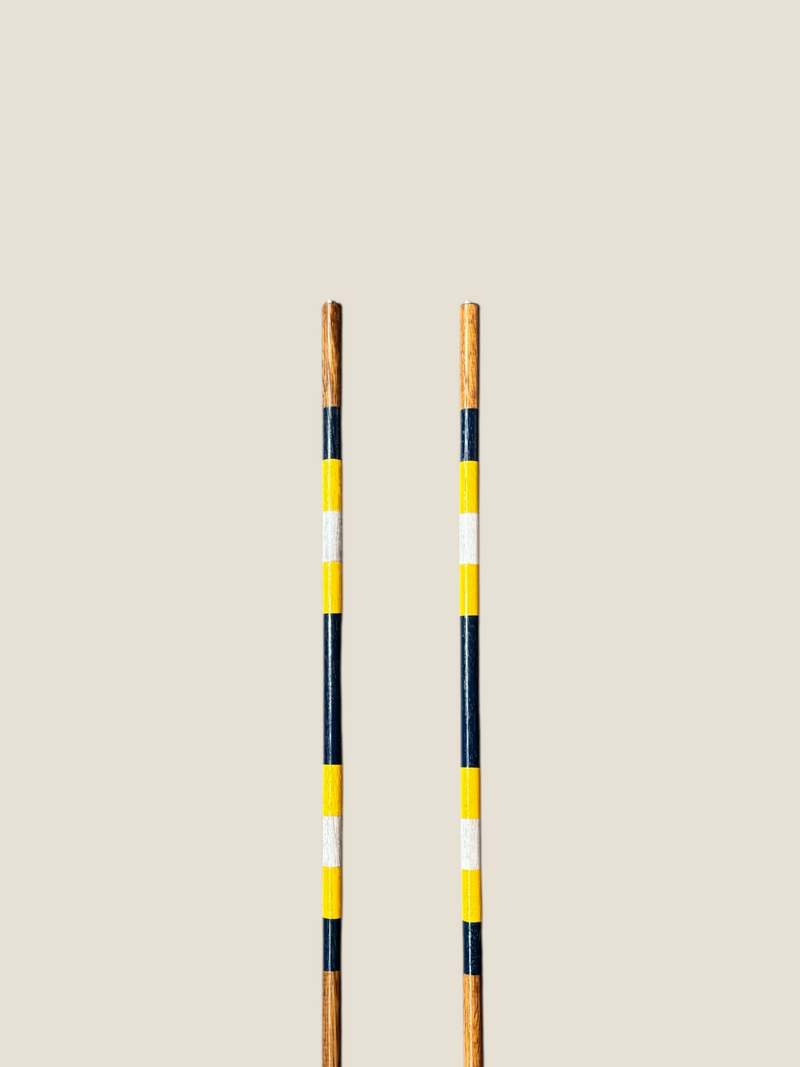 Troon 45-inch stained hardwood golf alignment sticks, shown side by side.