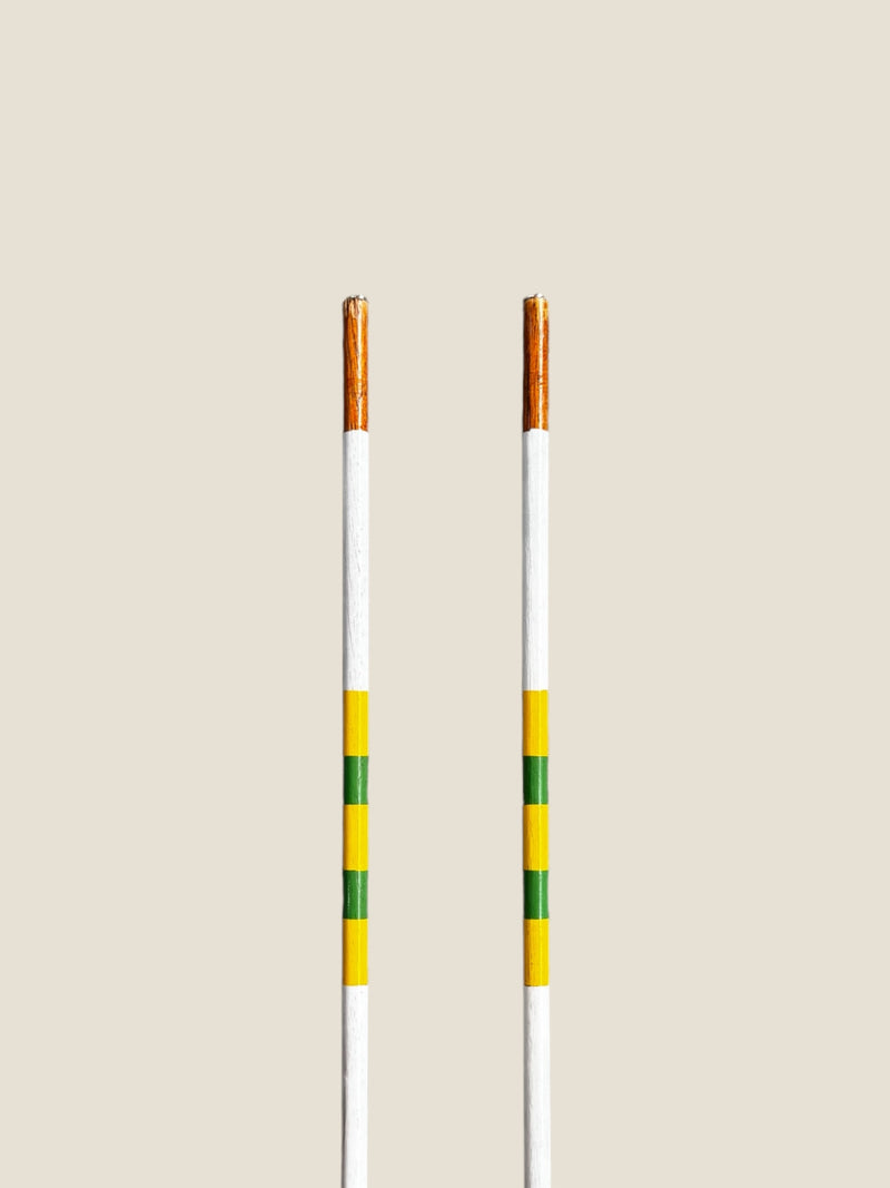 Dogwood 45-inch stained hardwood golf alignment sticks, shown side by side.